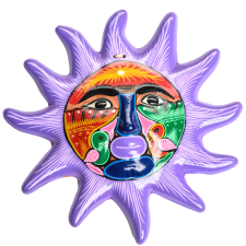 A Latinx art piece of the sun with purple flares and a multi-colored face
