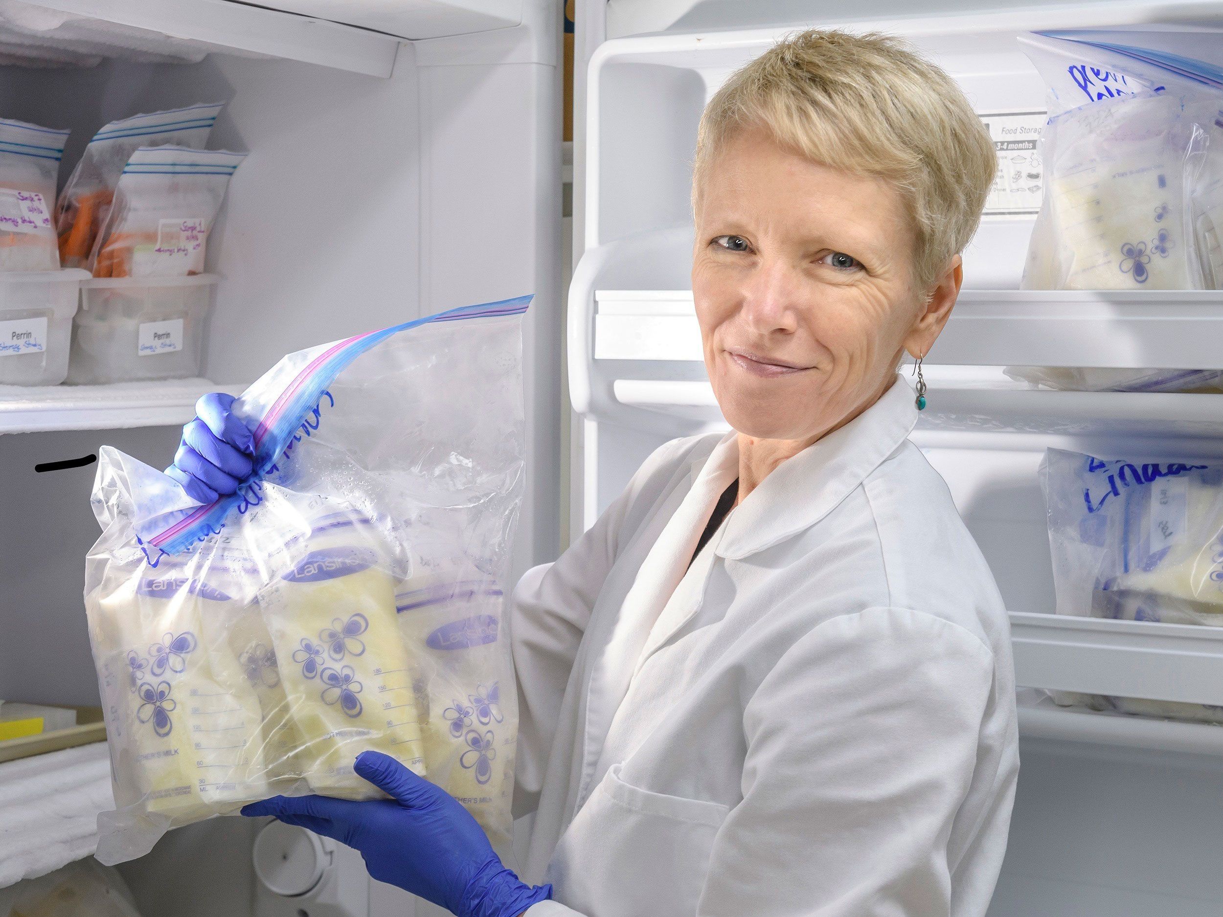 UNCG researcher Dr. Maryanne Perrin holds a bag with several donor milk samples in it