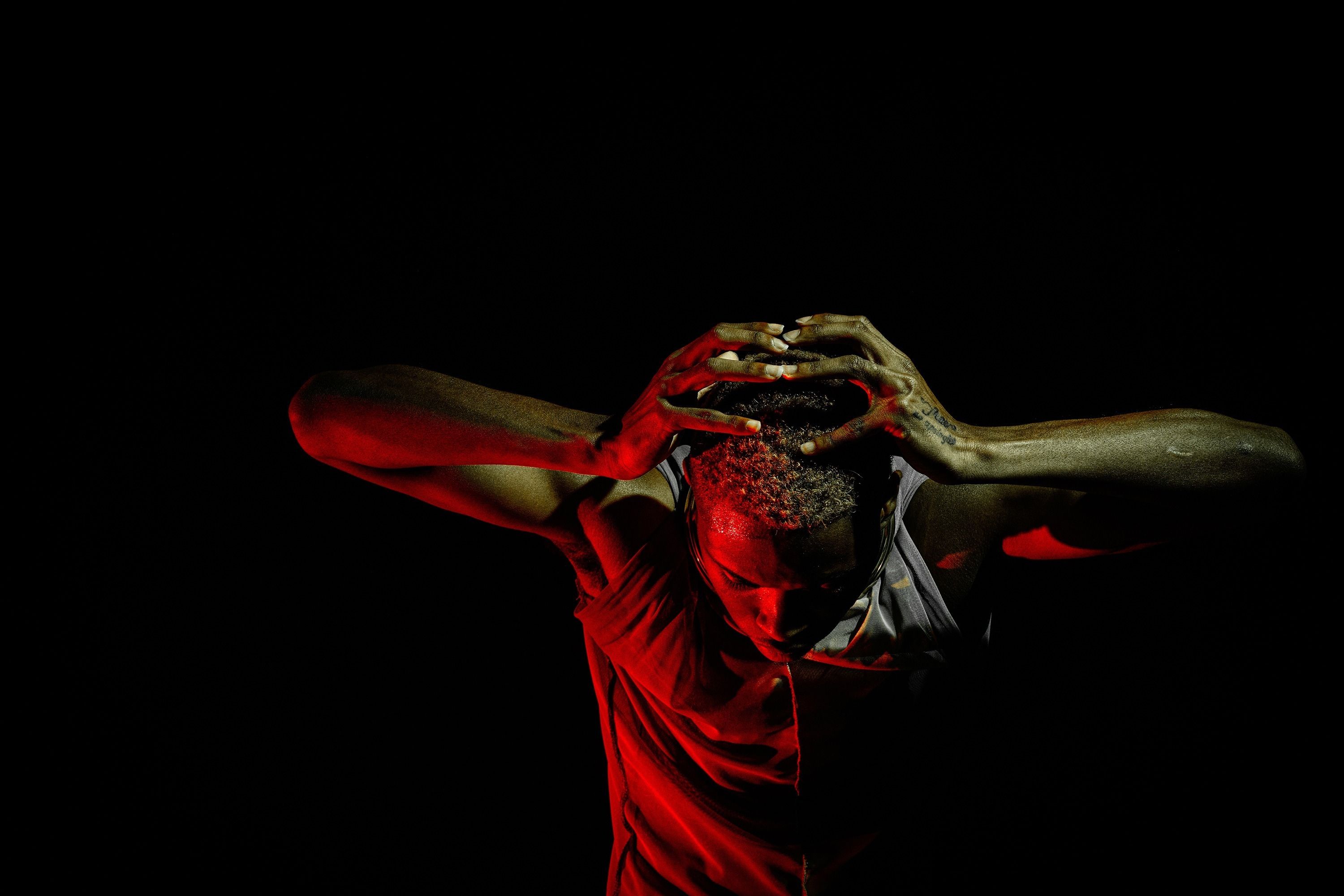 Hawkains placing hands on head and bowing