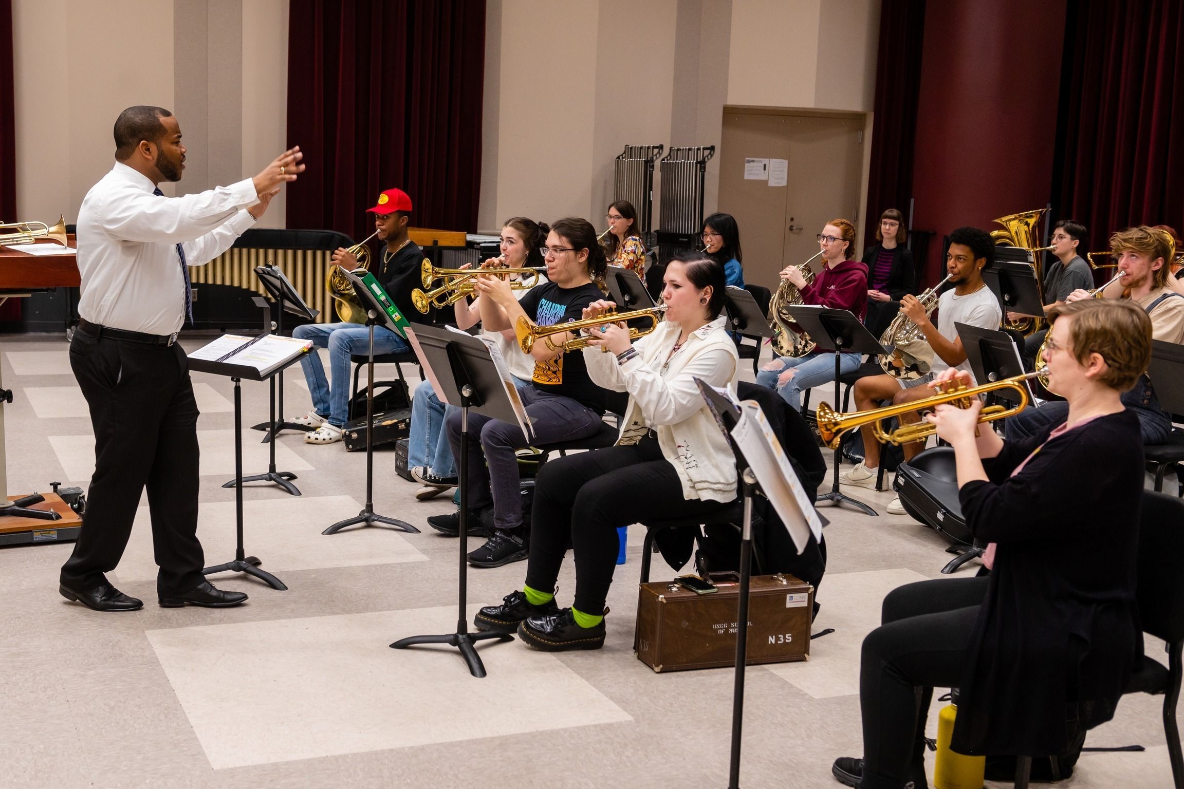 Dr. Parker conducting his music class.