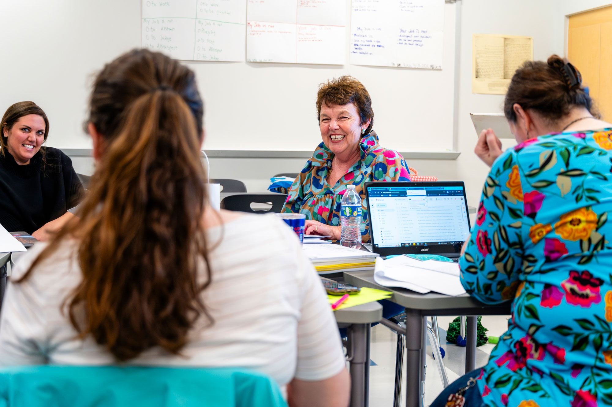 Teachers discussing lesson plans