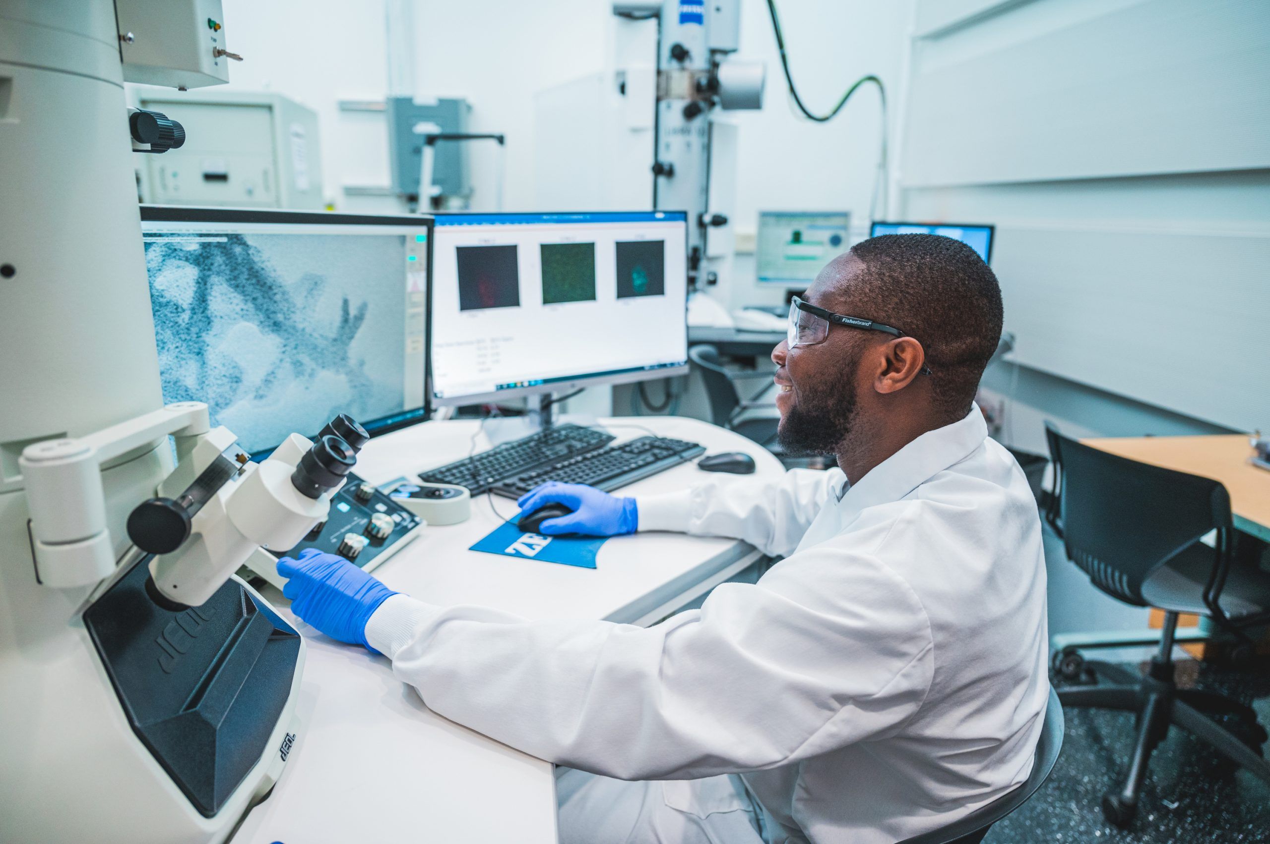 Kelvin Adrah looking at research findings