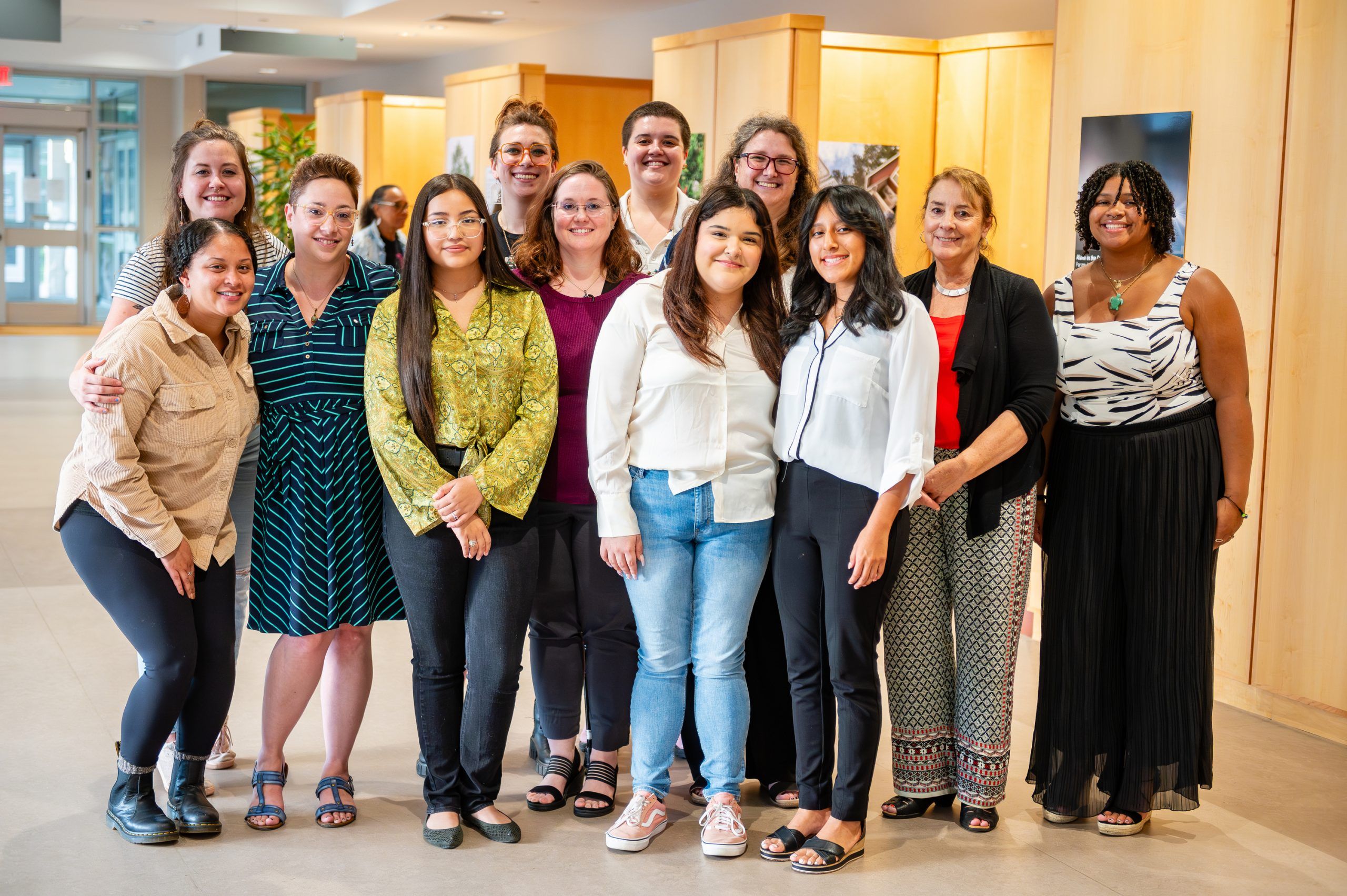 Teenagers posing at the opening of the exhibit