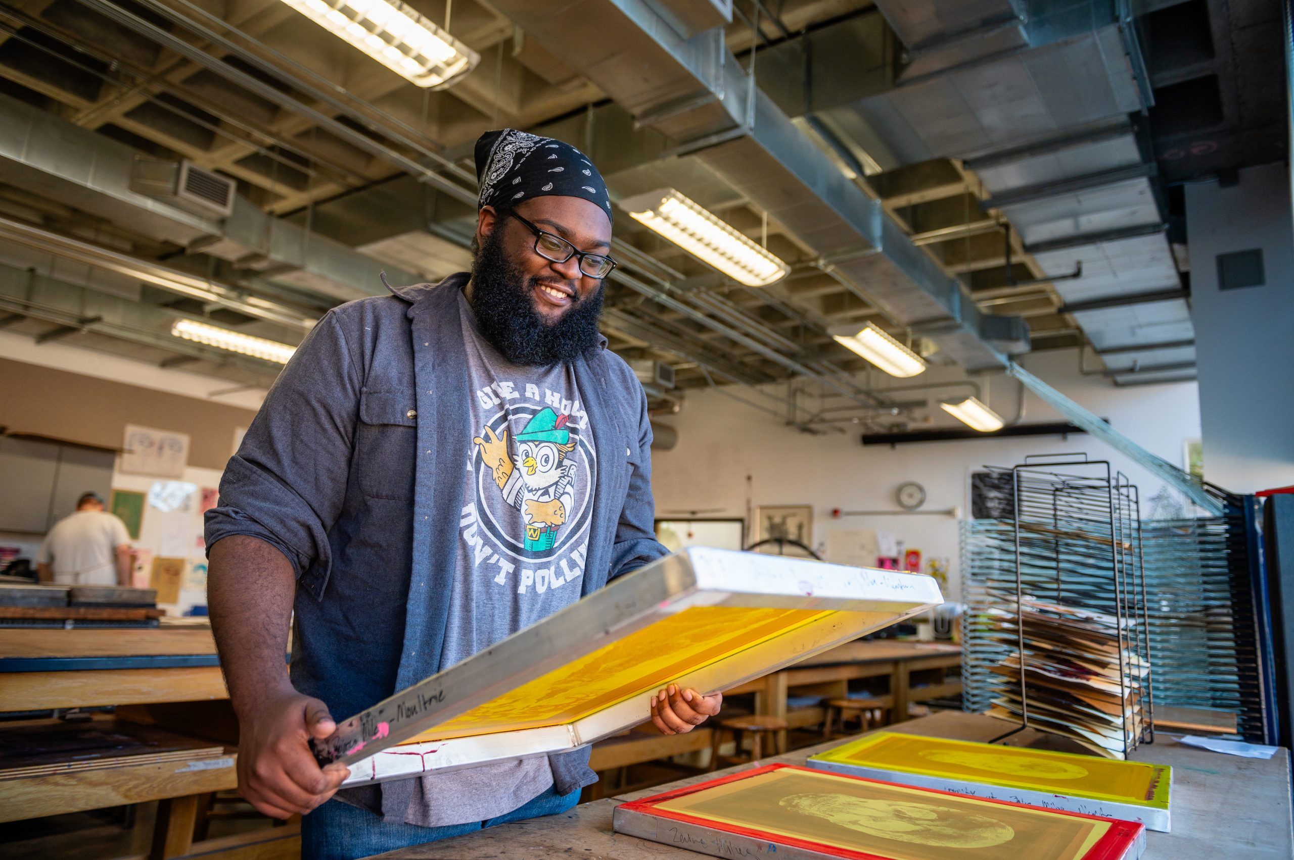 Zaire Miles-Moultrie holding a print