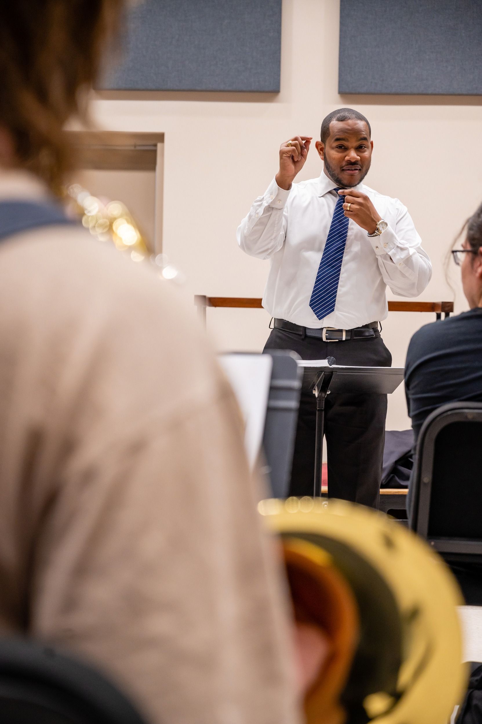 Dr. Parker conducting his music class.