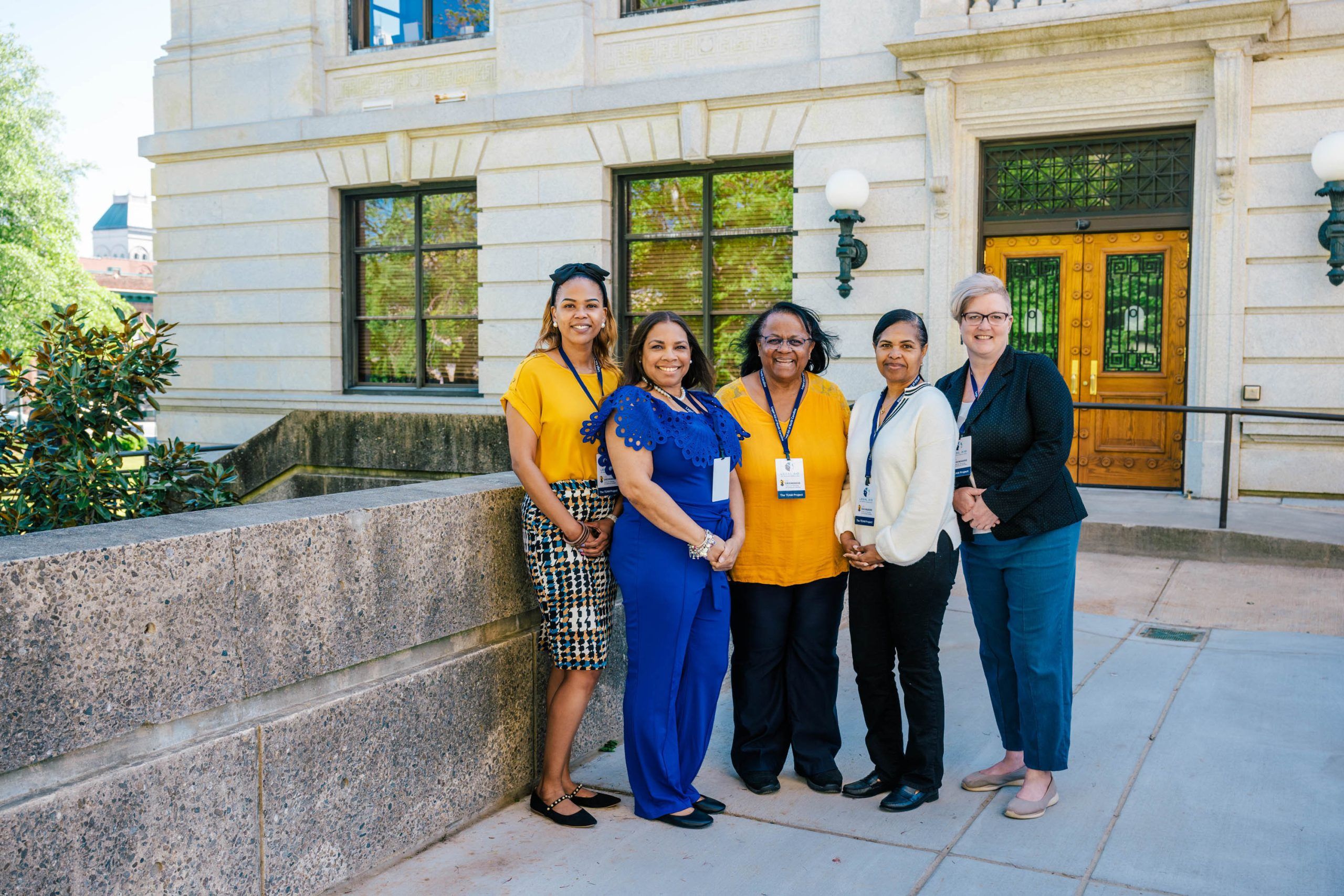 CHCS and Legal Aid teams stand outside the Guilford County Courthouse