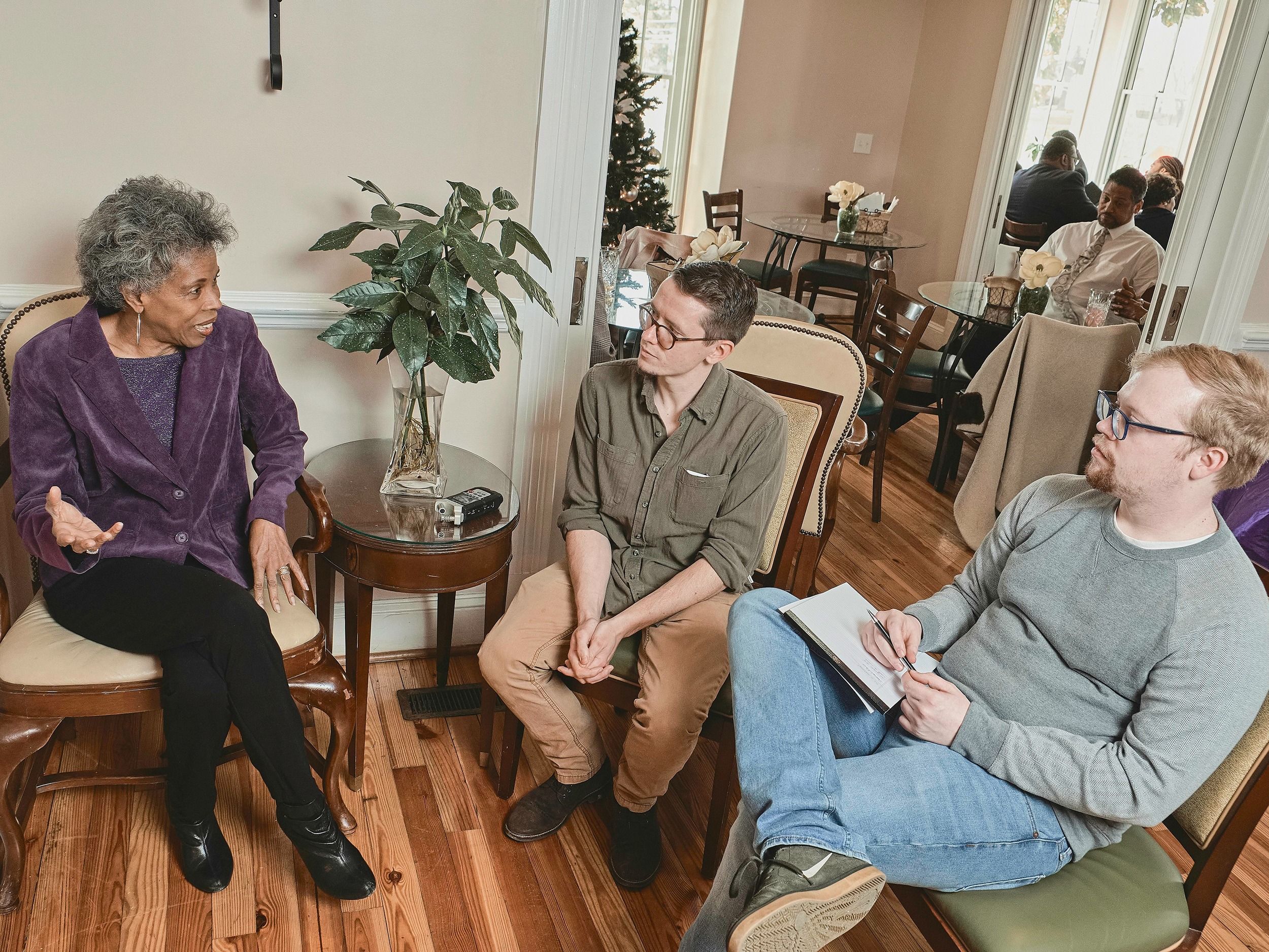 Students speaking to older residents to collect their memories
