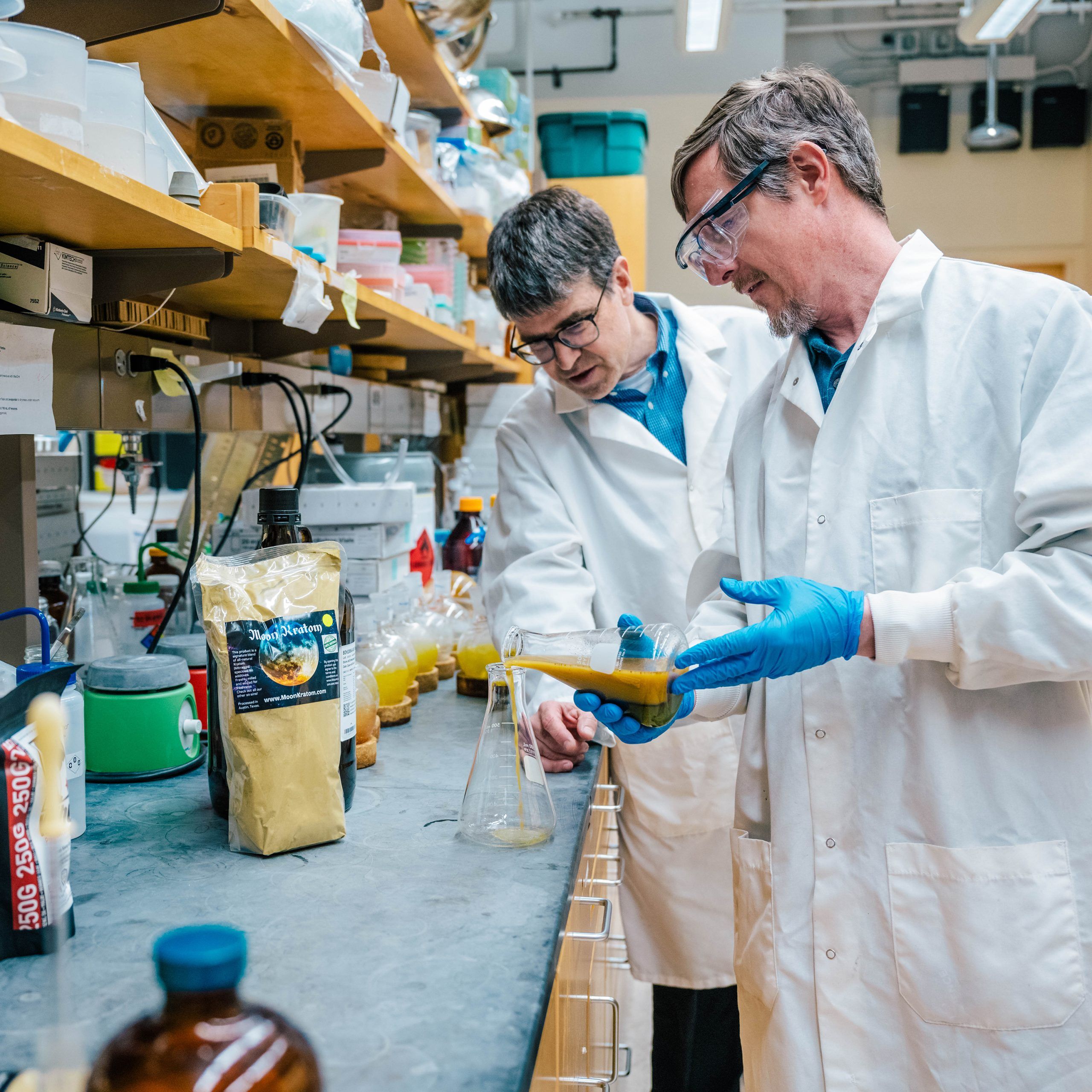 Kevin Oliver jr's son next to one of Dr. Lee's works