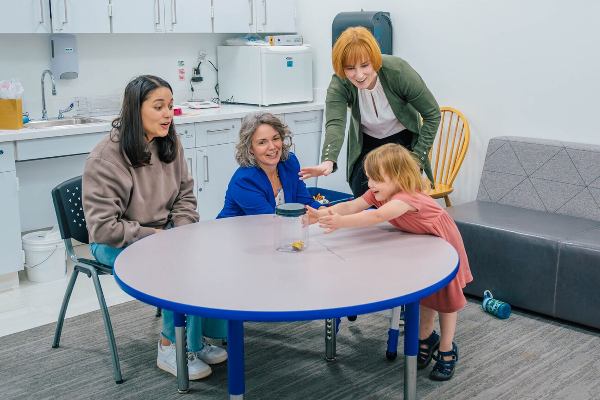 Kierra Sattler and daugter demonstrate iGrow tasks