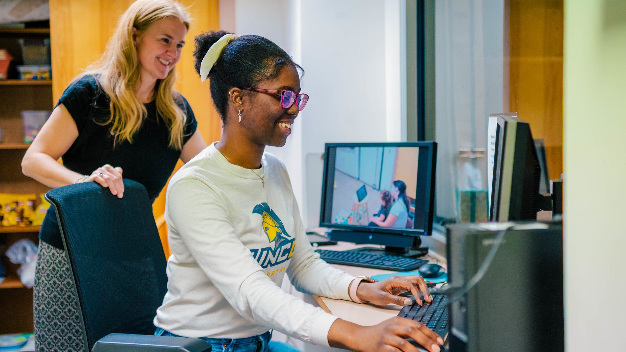 UNCG researcher Dr. Maryanne Perrin holds a bag with several donor milk samples in it