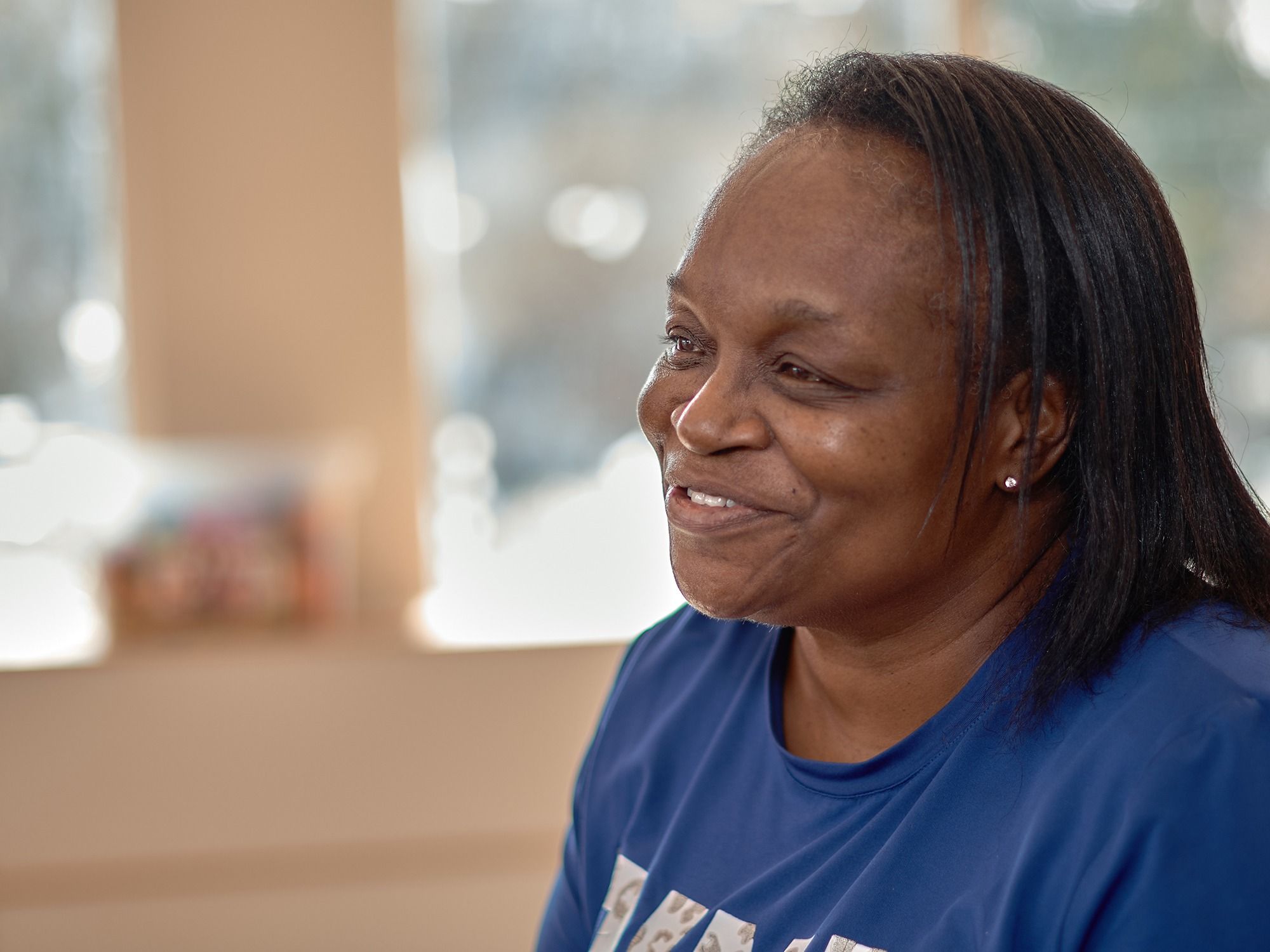 Another woman in a kinship caregiver group.