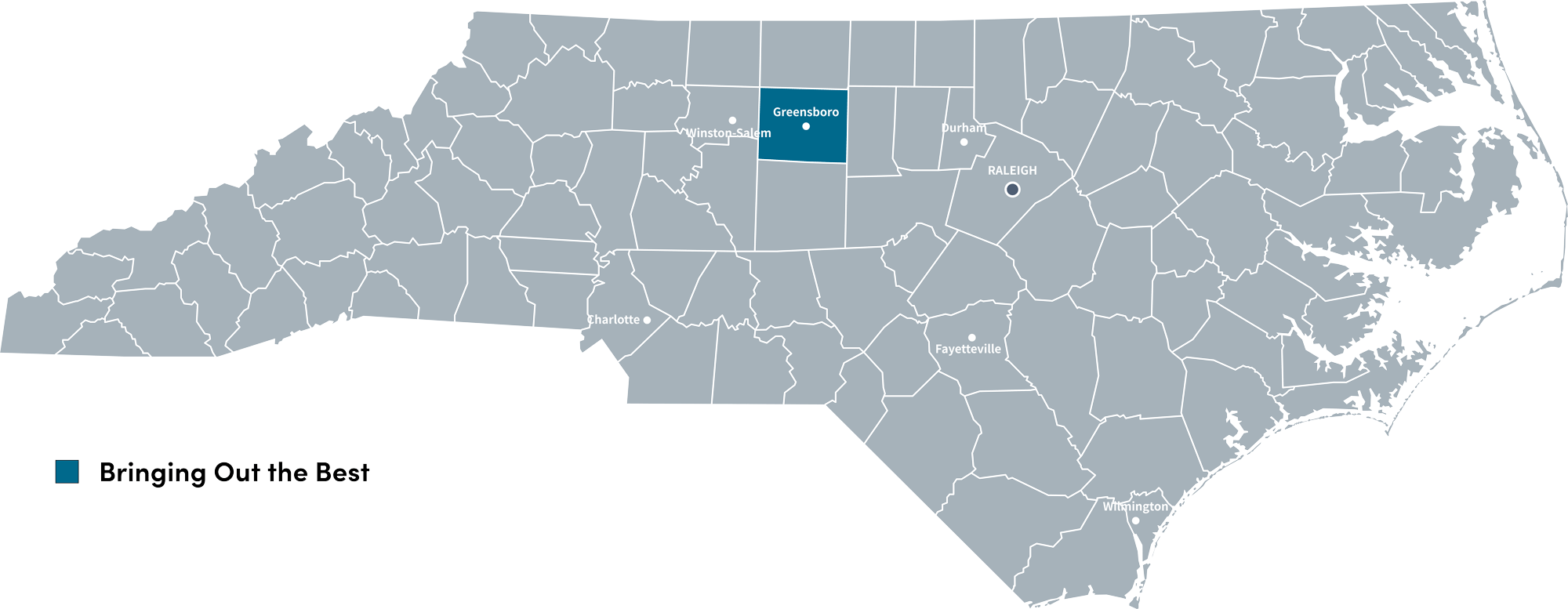 Gray image of North Carolina with Guilford county in blue