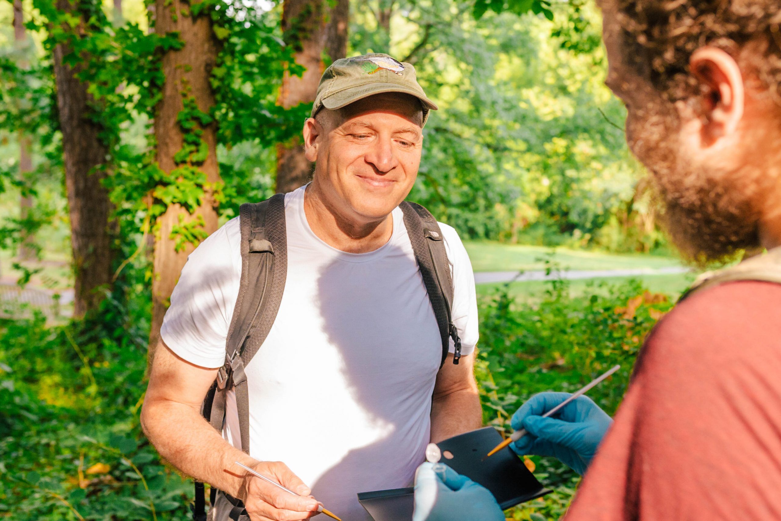 Wasserberg listening to a grad student speak