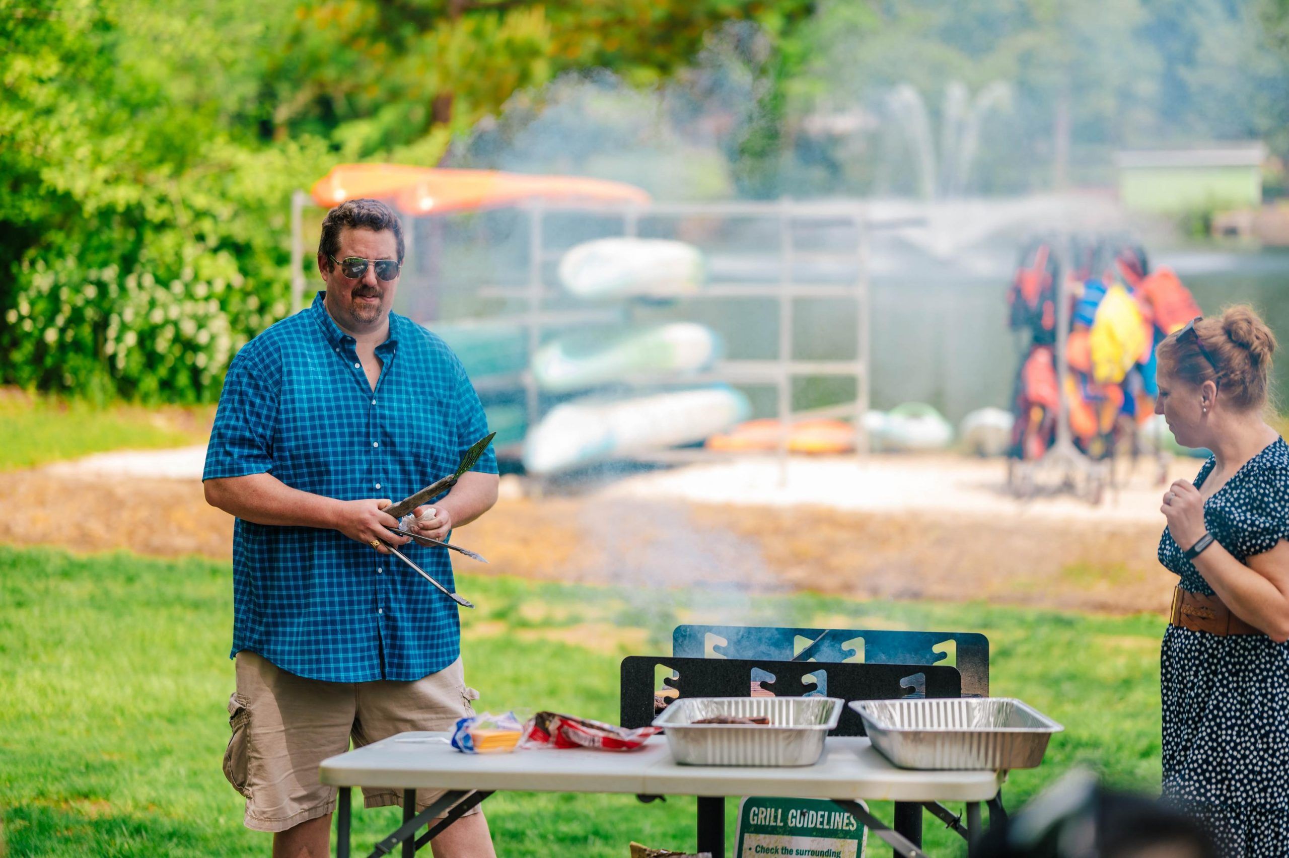Wideman next to the Bod Pod, a machine that takes measurements of a child's body