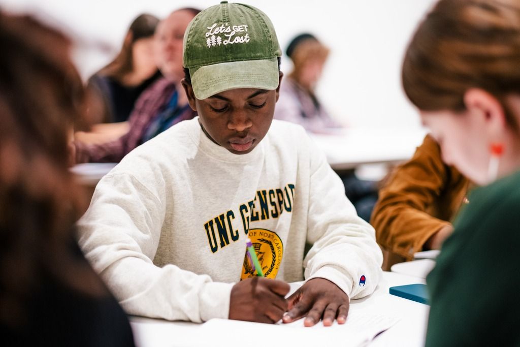 A student using Disney animation to draw