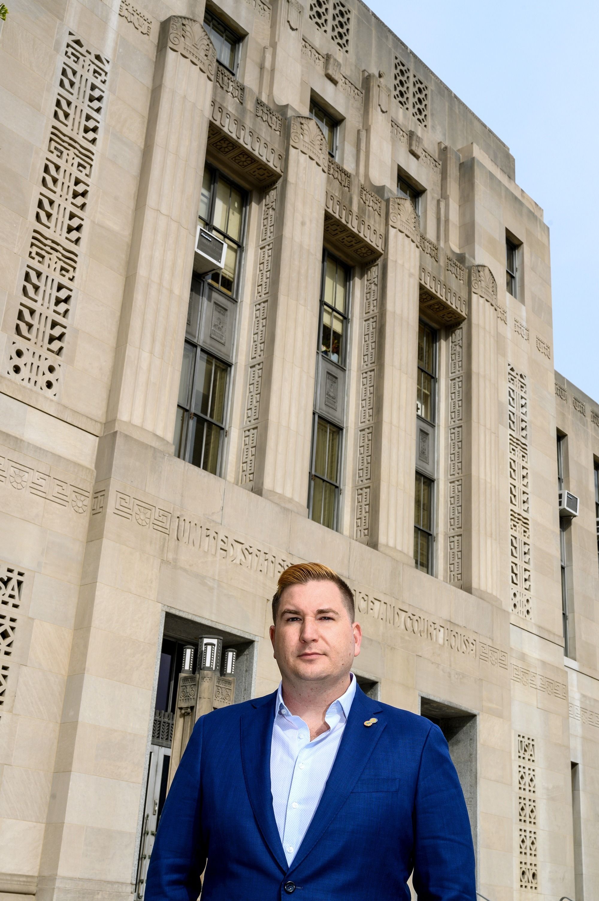 Dr. Hoppe stands outside the Federal Courthouse in downtown Greensboro.