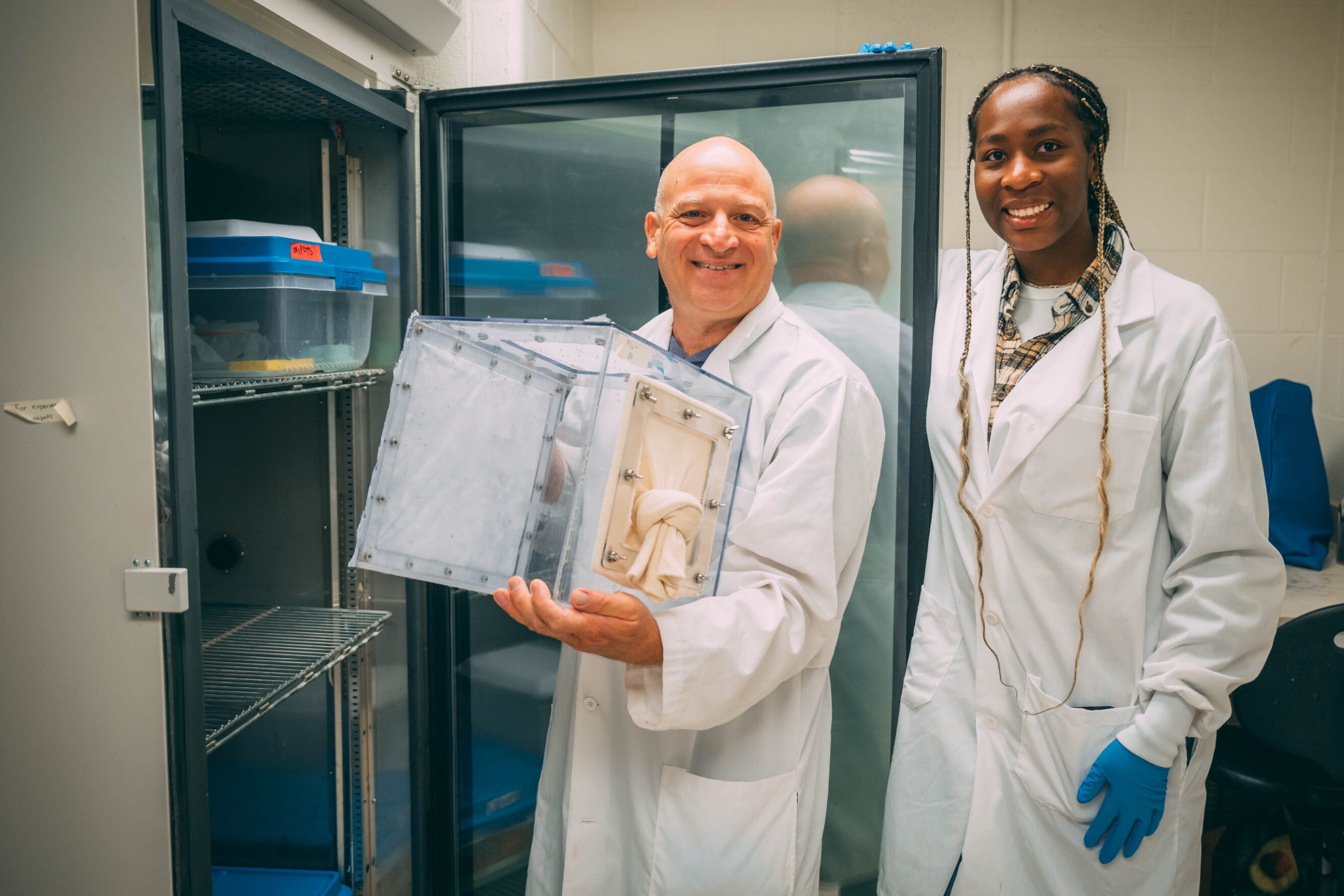 Wasserberg and Akabeuze maintaining Wasserberg's sand flea colony