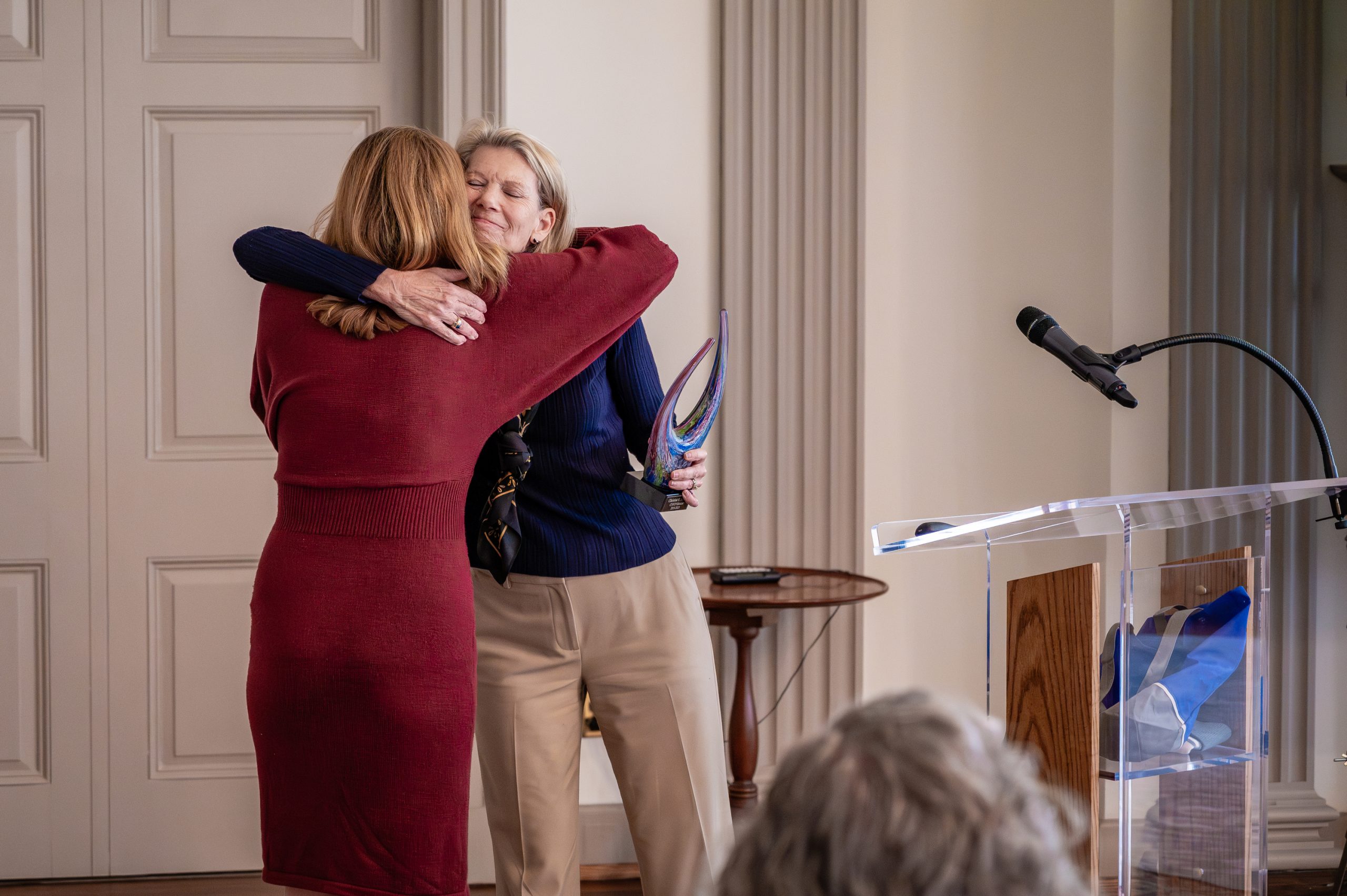 Christine Murray embracing member of CYFCP