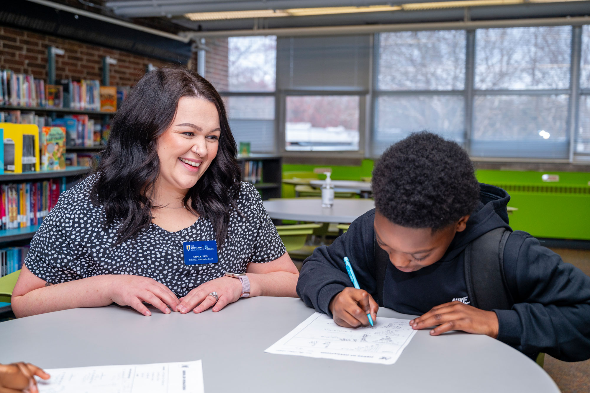 Grace Finn tutoring a student