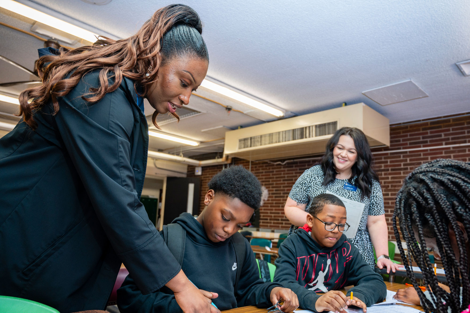 Grad students tutoring elementary students