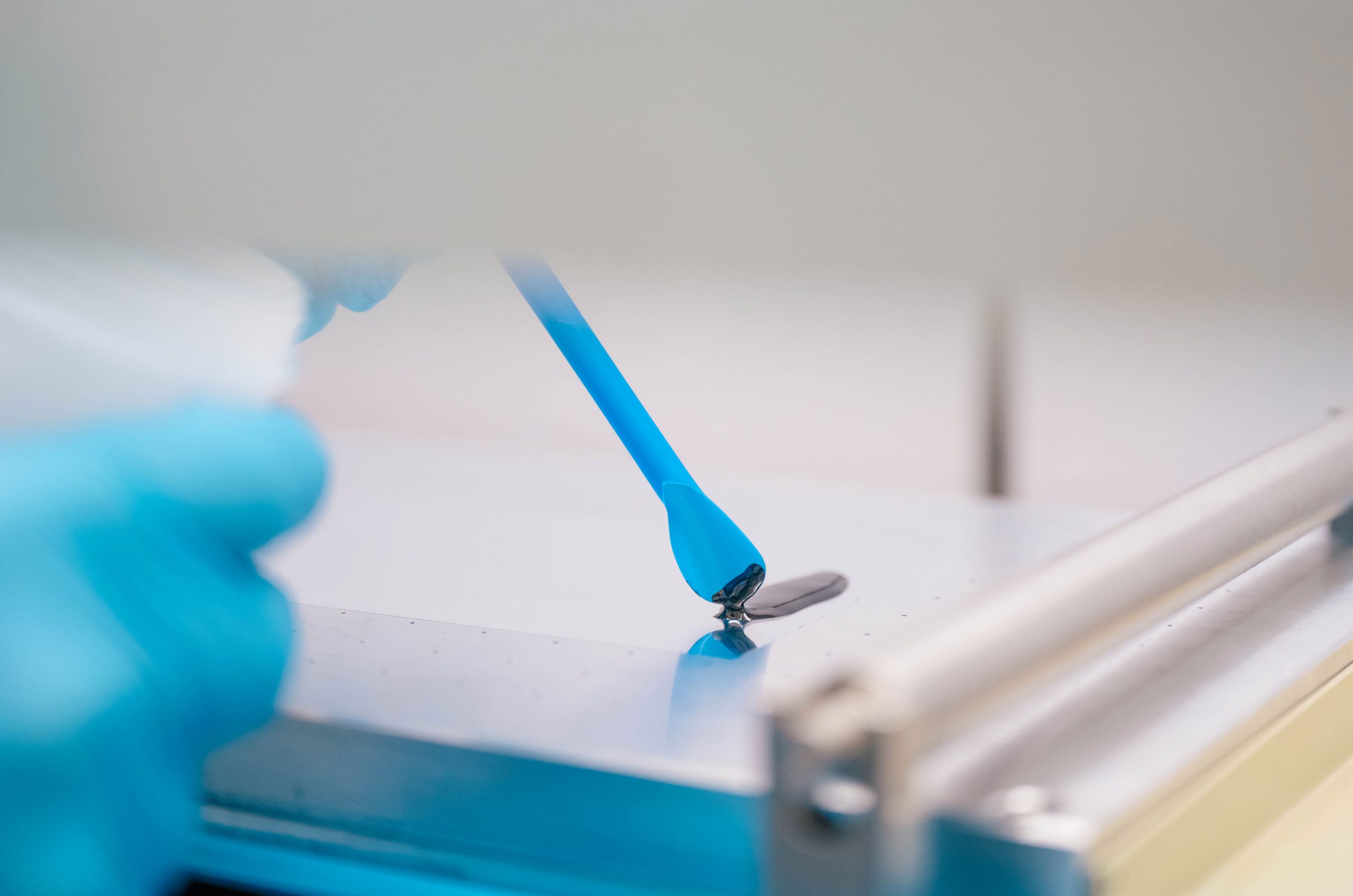 Wideman next to the Bod Pod, a machine that takes measurements of a child's body