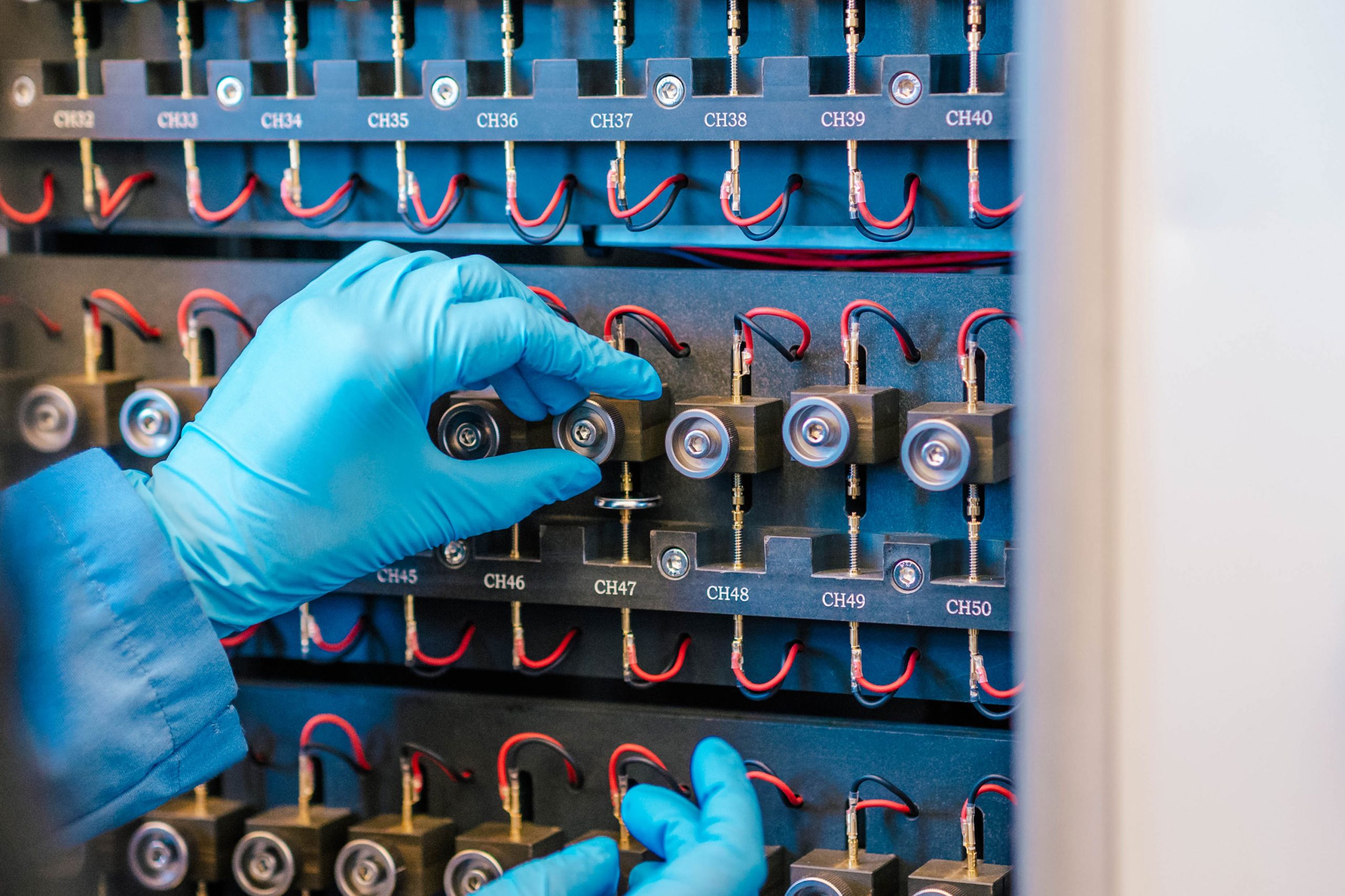 Wideman next to the Bod Pod, a machine that takes measurements of a child's body