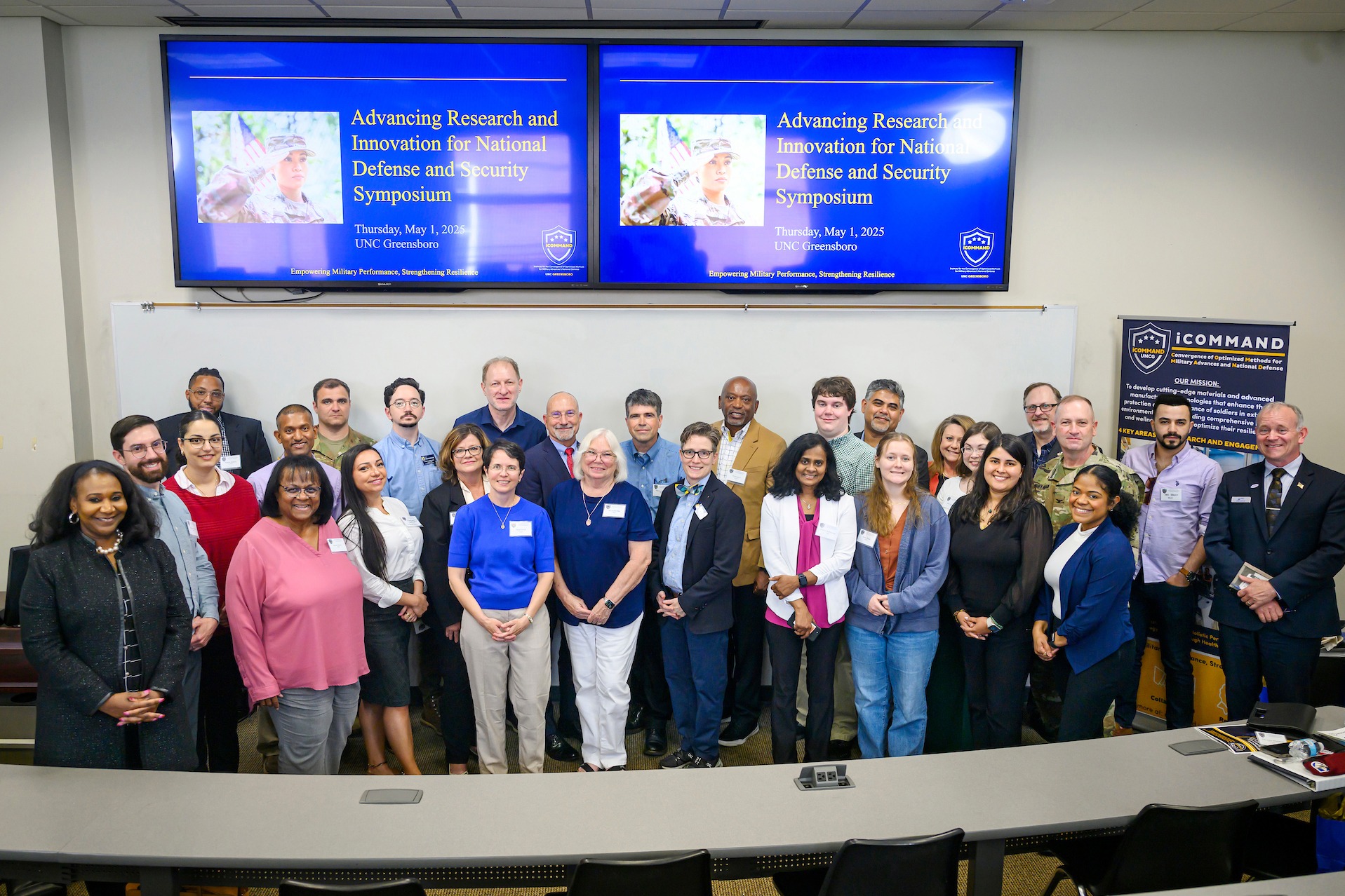 Wideman next to the Bod Pod, a machine that takes measurements of a child's body